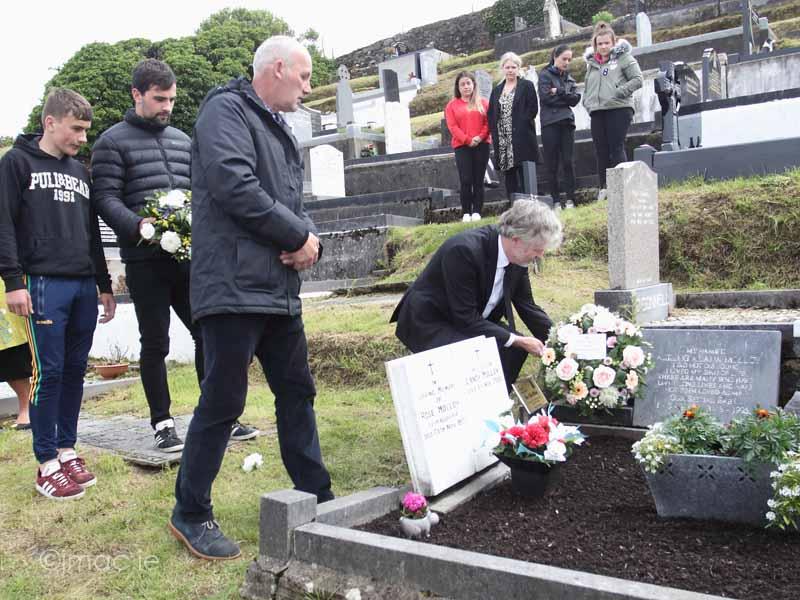 Australian Embassy's Head of Mission lays wreaths at the grave of Mary Ellen Molloy. Photo courtesy of John McConnell