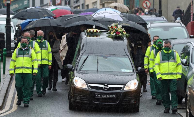 Mourners hear that beloved paramedic was a proud family man who dedicated his life to saving others