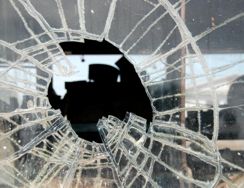 Rock fired through front window on New Year's Eve