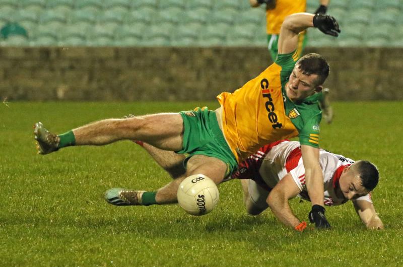 Jeaic Mac Ceallabhuí from Naomh Conaill in action as UCD run riot against UCC