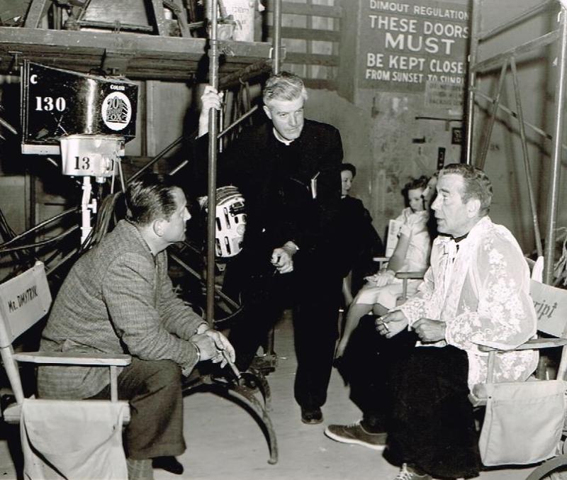 Buncrana's Fr Tony O'Doherty with Edward Dmytryk and Humphrey Bogart on the set of The Left Hand of God