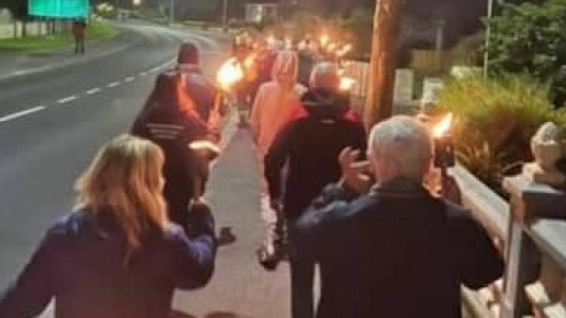 Torchlight procession for Tobias Molloy.