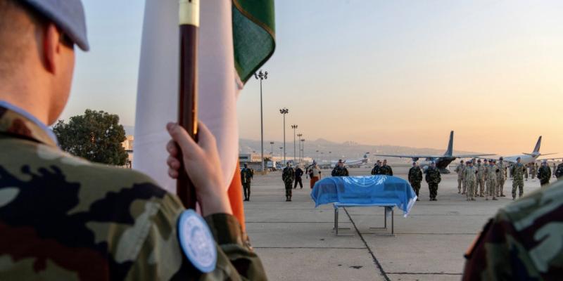 Body of Private Seán Rooney leaves for Ireland after comrades pay respects