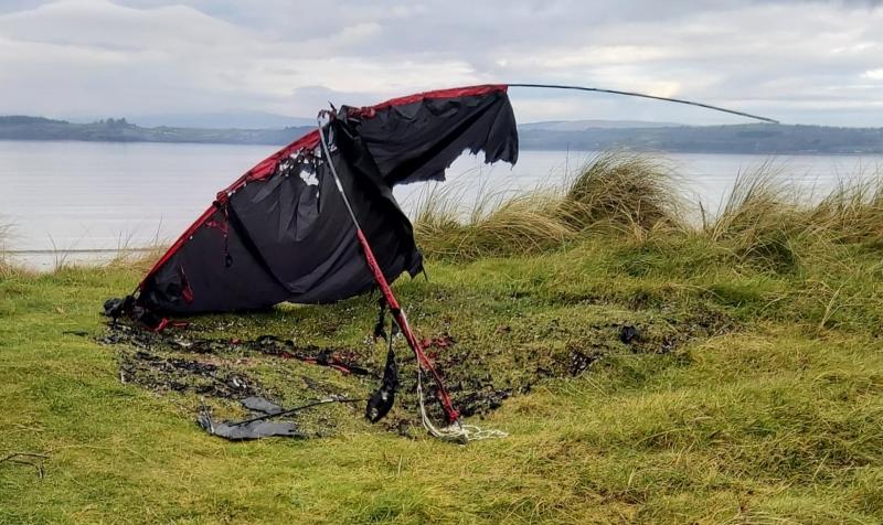 Burnt out tent and dozens of beer cans at protected Donegal beach
