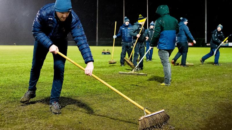 Michael Murphy mucks in to get pitch playable for Sigerson Cup fixture