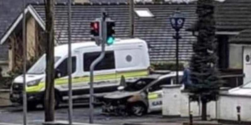 Man due in court after patrol car set on fire