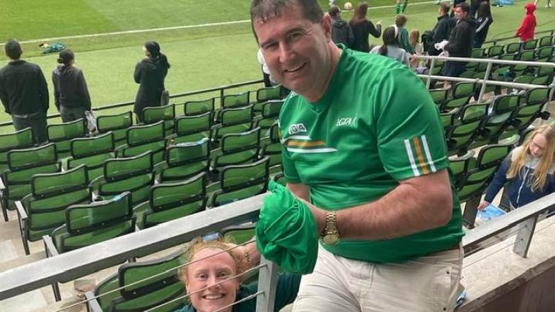 Amber Barrett gifts LGFA President Mícheál Naughton with Irish jersey in Texas