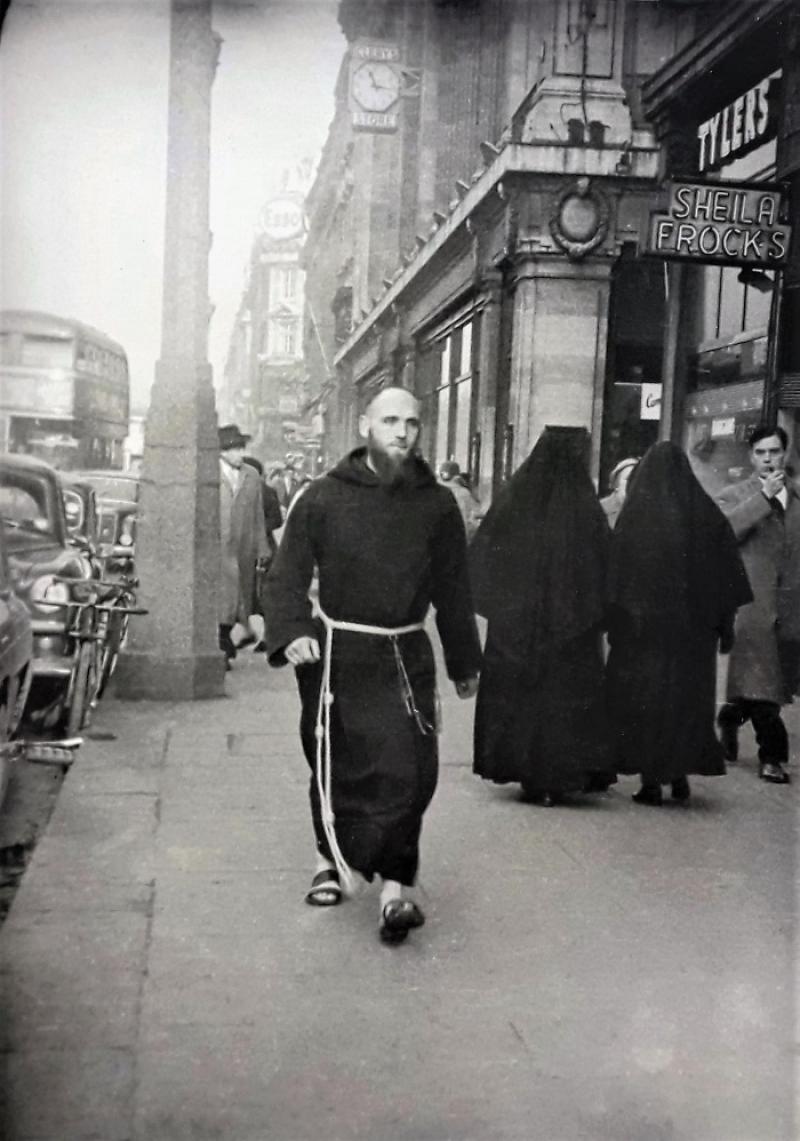 Powerful image of late Fr Mark Coyle OFM Cap ‘Under Clerys’ clock’ in 1961