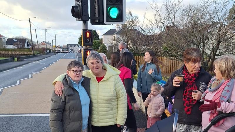 Local residents perform the honours as Dungloe traffic lights get switched on