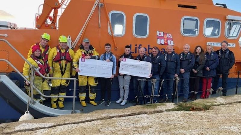 Milford GAA present rescue services with donation in memory of lost kayaker