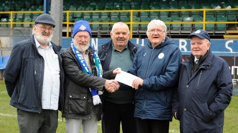 Lucky Jack Quinn presented with Finn Harps lotto jackpot cheque