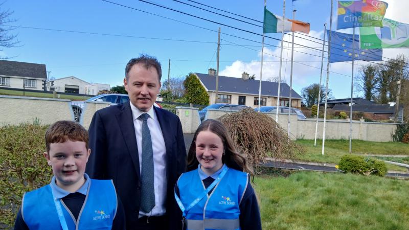 McConalogue raises Active Flag at St Columba’s NS following students' letter