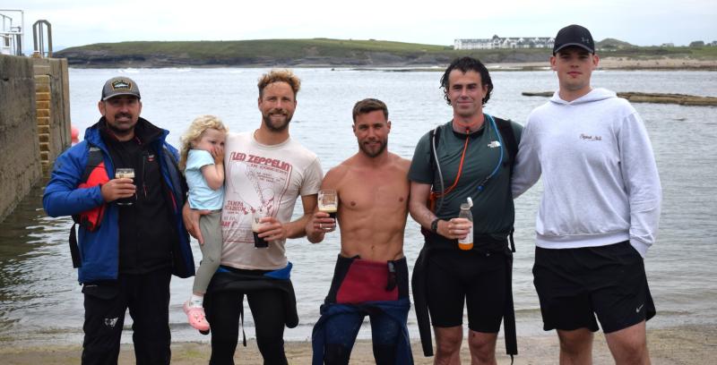 Three men paddleboard from Sliabh Liag to Bundoran to support youth counselling