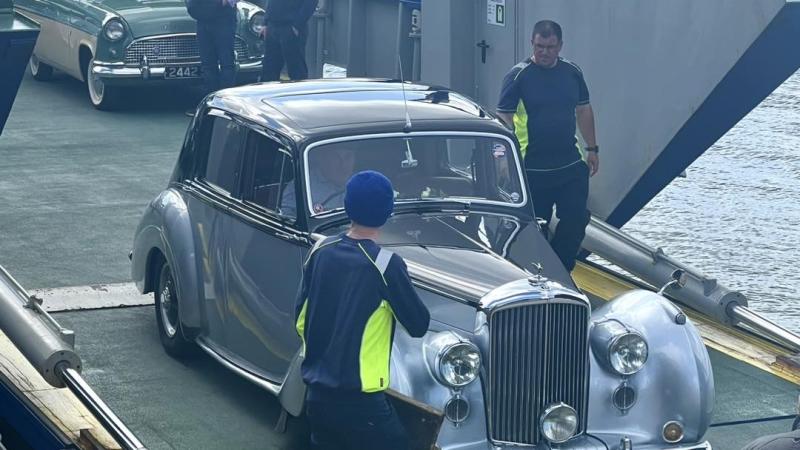 Classic cars celebrity Derek Mathewson boards the Arranmore Ferry