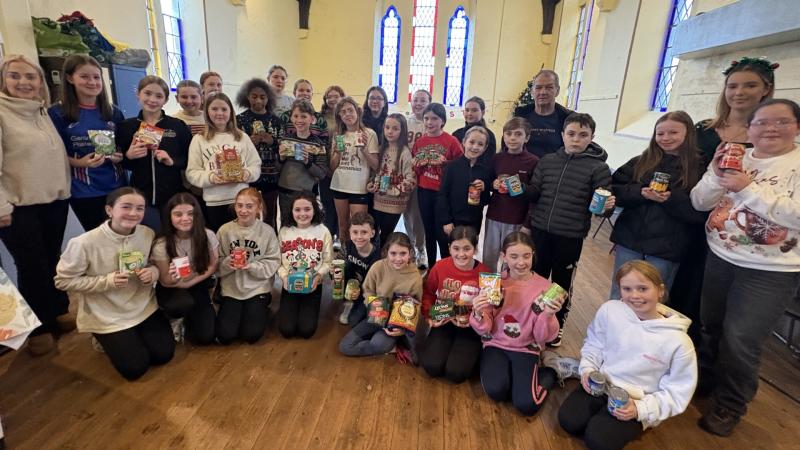 Inish Theatre Group brings some Christmas cheer, with donation to Buncrana SVP