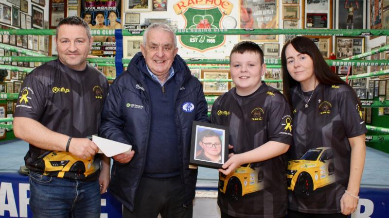 Finn Valley AC make donation to the Christian McCullagh fund from Remembrance Run