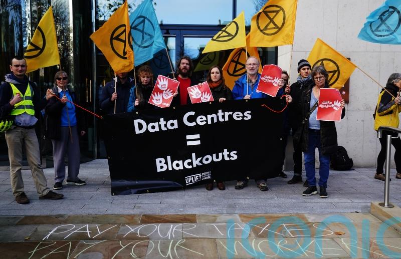 Crowd gathers at Amazon’s European HQ as part of worldwide Black Friday protest