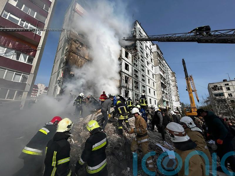 Dozens of people including children dead after missile and drone attacks hit Ukraine