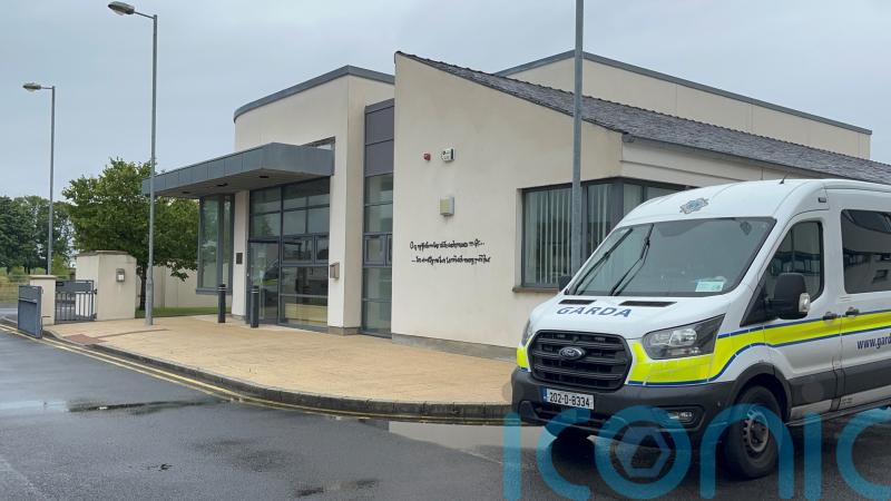 Man, 38, charged with murder after body found in water