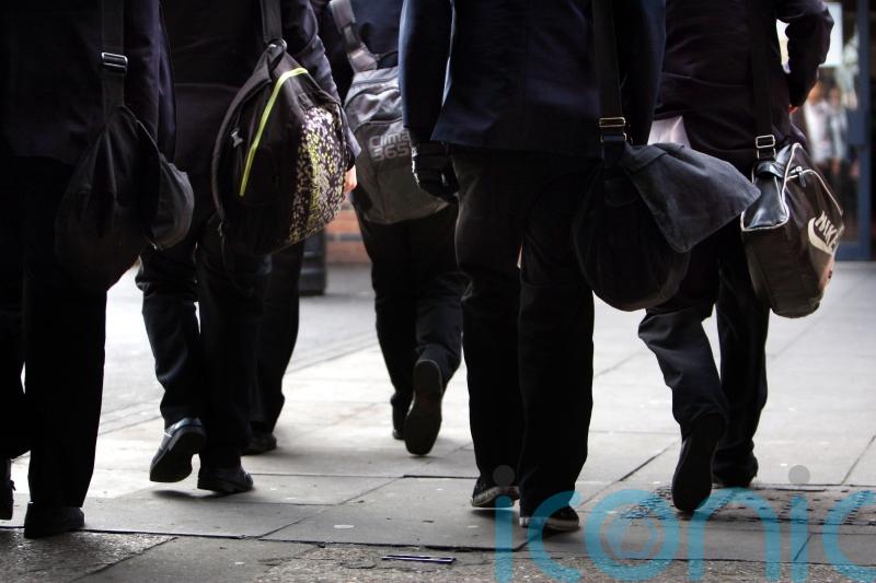 School secretaries and caretakers begin indefinite strike