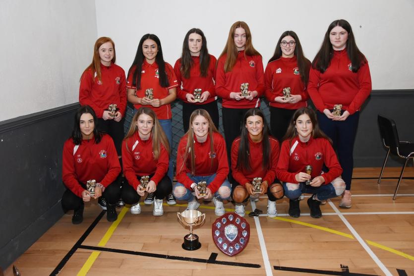 U16 girls, league and cup winners.
