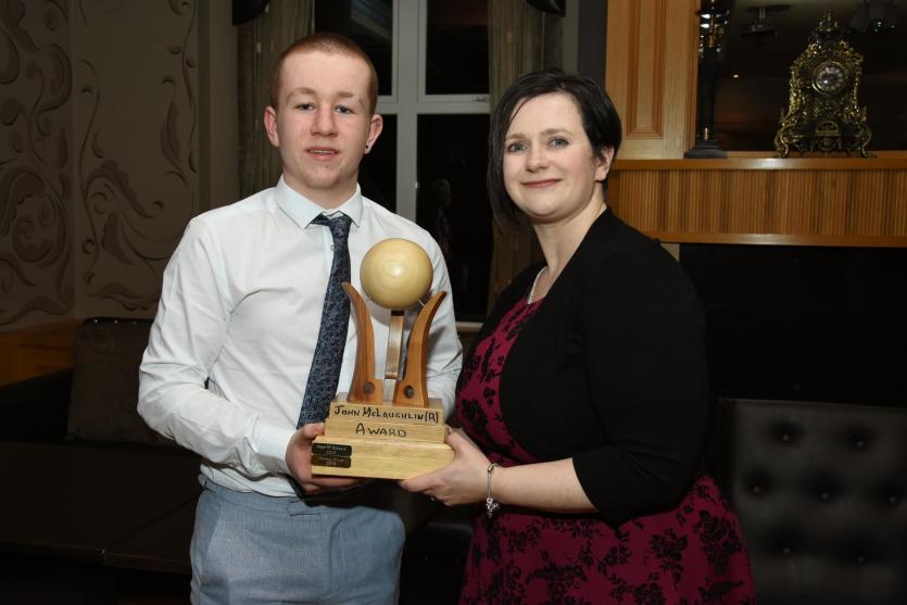 Keelan Hegarty is presented with the John McLaughlin (Rustard) Award by Susanna Rustard