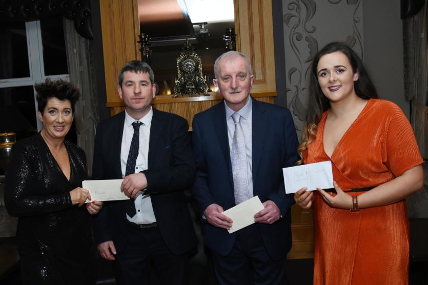 Club Chairman Pat McLaughlin presents tokens of appreciation to special guests Michelle McKenna, Gerard Callaghan and Aoife McColgan