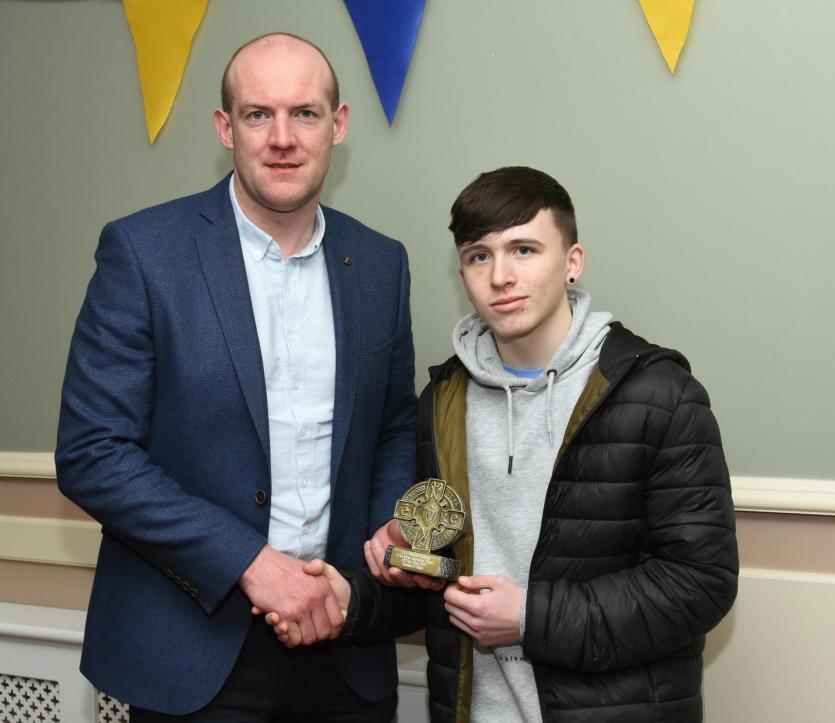 Caolan Henry, U16 Most Improved Player, with Neil Gallagher