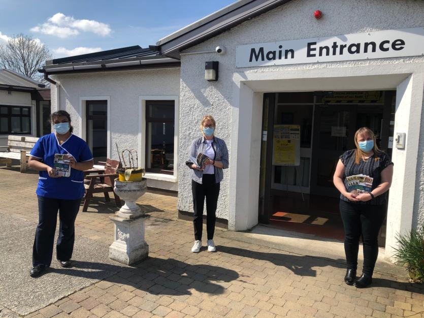 'Our Days and Nights' book being handed over to Buncrana Community Hospital 