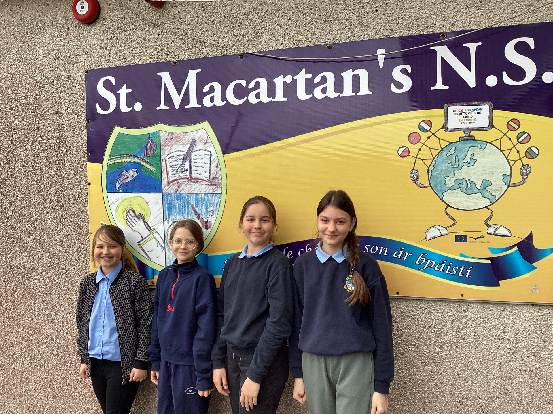 Four young Ukrainian pupils pictured yesterday at St Macartan's National School, Bundoran, proudly displaying their new uniforms and smiles