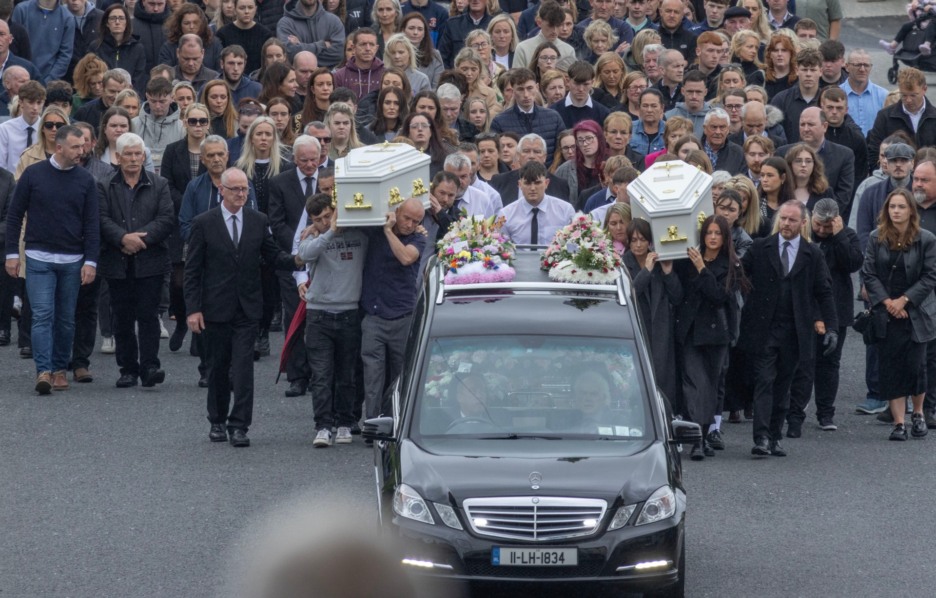 Natalie and Ella McLaughlin coffins been brought to the Sacred Heart Church in Carn 