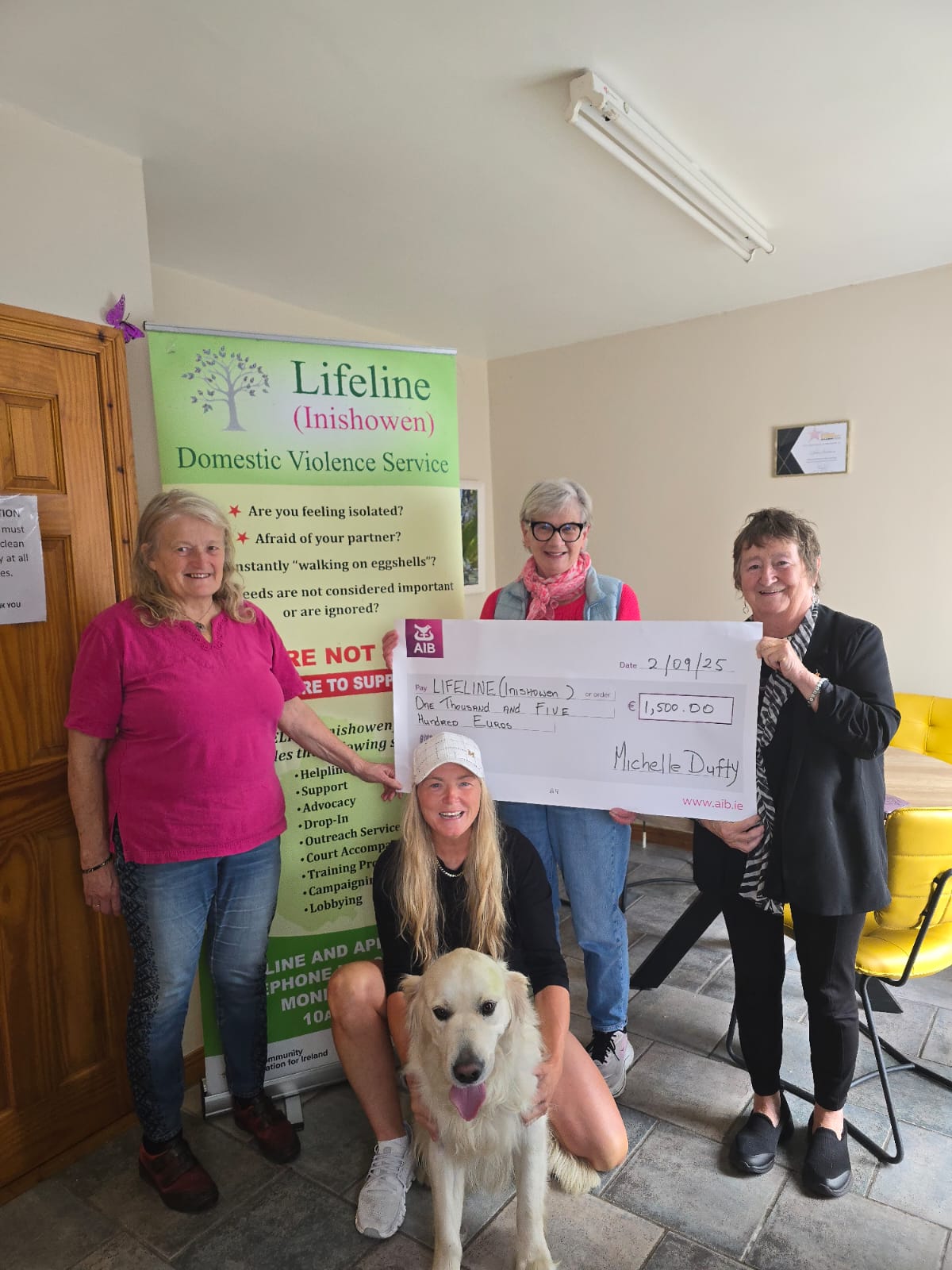 Michelle Duffy at the front of the picture presenting a cheque of €1,500 to Lifeline Inishowen members from left to right, Grainne Mc Carroll (Trustee), Eleanor Lamb (Chairperson) and Mary Doherty (Coordinator)